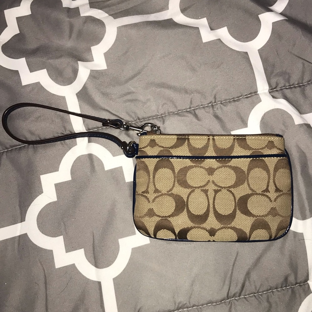 Small Wristlet In Signature Canvas